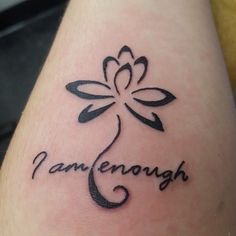 a woman's foot with a tattoo on it that says, pannenough