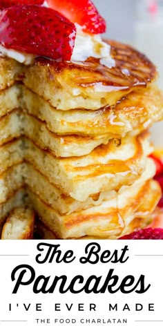 pancakes stacked on top of each other with strawberries in the middle and text overlay