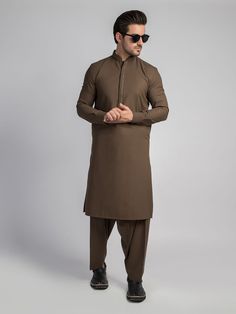 Mens Olive Brown Plain Shalwar Kameez Mens Eid Shalwar Kameez Color: Olive Brown Fabric: Wash and wear Dress Type: Handmade Please beware when you're choosing the variations of this dress. Feel free to discuss any issue regarding your order. You'll get a quick solution and will be satisfied. Designer Kurta With Naqshi For Eid, Traditional Jamawar Kurta With Naqshi, Jamawar Kurta With Dabka, Straight Cut, Unstitched Nehru Jacket With Naqshi For Eid, Straight Jamawar Kurta With Dabka, Brown Unstitched Suit With Dabka For Eid, Formal Brown Kurta For Eid, Eid Brown Unstitched Suit With Dabka Detailing, Brown Unstitched Dabka Suit