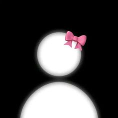 two snowmen with pink bows on their heads and one is black in the background