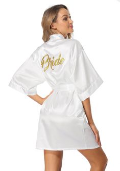 PRICES MAY VARY. Material: The satin robe made of high-quality silk-imitation fiber,softness and comfortable Details: Half sleeve, loops around the waist and a sash to tie, "Maid of Honor", "Bride" or "Bridesmaid" "Mother of the Bride" letter on robe back with Gold Glitter Gifts: This robe with embroidered personalized is perfect gifts for wedding party, bridal night party, bachelorette party, best choice of shower bathrobe and make up robe for bride and bridesmaids Size: Available in S-XL. In o Bridal Robes Getting Ready, Bride Kimono, Satin Bridal Robe, Short Kimono Robe, Bridesmaid Kimono, Bridal Kimono, Bridesmaid Pyjamas, Wedding Kimono, Lace Bride