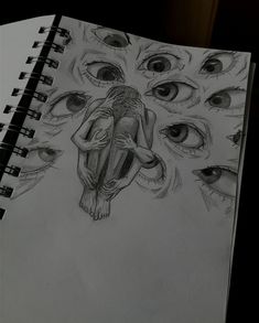 a pencil drawing of an eyeballed human being surrounded by eyes