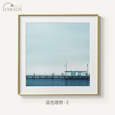 an image of a pier in the middle of the ocean with water and sky behind it