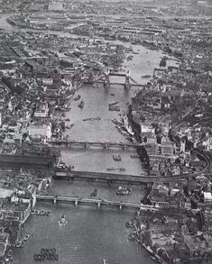 an aerial view of the river thames in london taken from above, looking down on the city