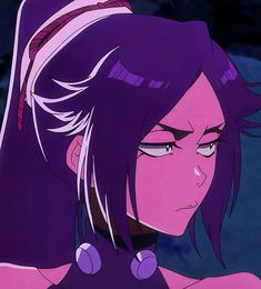 an anime character with purple hair and piercings looking at something in her hand,