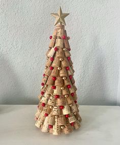 a small christmas tree made out of wine corks