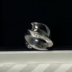 Vintage Mikal Jon Bayanihan Sterling Silver Wave Modernist Ring Brand: Mikal Jon Bayanihan Color: Sterling Silver Size: 7 Approx. 1.5”H From Bottom Of Band To Highest Point Of Wave; 1”W At Top; .25”W Band Weight: 18 Grams Retail: $500 (Sold At Auction) Description: Vintage (80’s) Sterling Silver Wave Modernist Ring, Signed By Designer Mikal Jon. Condition: Vintage; Some Slight Surface Scratches But To Be Expected From A 40yr Old Ring. Has A Dramatic Wave Design, Stunning From Every Angle. See Av Louis Vuitton Gucci, Old Rings, Modernist Ring, Wave Design, Womens Jewelry Rings, Yves Saint Laurent, Saint Laurent, Fendi, Dior