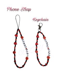 a pair of red and black beaded earrings with the words phone strap keychain