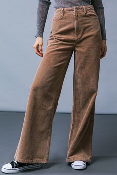 A corduroy pant featuring front closure, side pockets, wide leg and back pockets This season, make a statement in How Dare You Corduroy Pants. Crafted from luxuriously soft corduroy, these pants feature a front closure, side pockets and a wide leg cut that allows for maximum movement and comfort. Finer details include back pockets, adding a touch of sophistication to your look. Wear these pants to unlock a new level of class and style. Details Self : 75% Cotton 25% Polyester Size & Fit - Model i Burgundy Corduroy Pants Outfit, Corduroy Pant, Girl Vibe, Health Books, Flying Tomato, Skirt Jumpsuit, Resort Collection, Virtual Closet, Swim Accessories