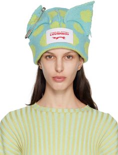 Rib knit lambswool-blend beanie in blue. Exposed seams and jacquard polka-dot pattern in green throughout. · Graphic appliqués with safety-pin hardware at crown · Logo patch at face · Rolled brim · Concealed logo hardware at back face · Silver-tone hardware Available exclusively at SSENSE. Supplier color: Light green/Light blue Braids With Beanie, Loverboy Beanie, Charles Jeffrey Loverboy, Charles Jeffrey, Strapless Ruffle Dress, Aesthetic Outfits Men, Cute Beanies, Birthday Fits, Crown Logo