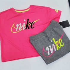 Nwt Bin Pe S Pink Short Sleeve Sportswear T-shirt, Nike Sporty Pink T-shirt, Nike Sets With Graphic Print And Crew Neck, Nike Cotton Athleisure Sets, Nike Crew Neck Sets With Graphic Print, Nike Graphic Print Crew Neck Sets, Pink Graphic Print Sets For Playwear, Casual Pink Cotton Sets, Nike Casual Loungewear Sets