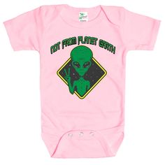 Rapunzie's adorable and out-of-this-world baby onesie featuring a captivating green alien graphic and the playful caption, "Not From Planet Earth." Crafted with utmost care, this onesie is made from 100% cotton to ensure the softest touch against your little one's delicate skin. Designed for comfort and style, this onesie comes with short sleeves, making it perfect for warmer days or as a layering piece during cooler weather. The vibrant green alien graphic adds a touch of whimsy and sparks the Green Fitted Casual Onesie, Funny Graphic Print Onesie, Fitted Green Playful Onesie, Playful Green Fitted Onesie, Green Fitted Playful Onesie, Cute Fitted Green Onesie, Funny Graphic Print Short Sleeve Bodysuit, Funny Graphic Print Onesie For Playtime, Funny Fitted Onesie With Graphic Print