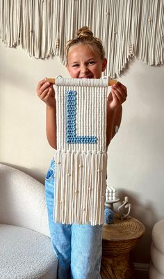 These macrame letters are the ideal way to add a personal touch to a child's space and make for a thoughtful, one-of-a-kind gift. Whether you're looking for a special present for a baby shower or to add a personalized touch to your own home, these alphabet wall hangings are the perfect choice. Each letter is carefully handmade with love and attention to detail, ensuring that it's not only a beautiful piece of decor, but also a special token of affection. Create a magical, handmade atmosphere wit Macrame Letters, Macrame Kids Room, Alphabet Wall Hanging, Kids Wall Decoration, Nursery Macrame, Macrame Nursery Decor, Macrame Projects Ideas, Macrame Gifts, Macrame Decoration