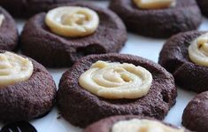 chocolate cookies with peanut butter frosting on top