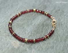 This bracelet features beautiful garnet faceted rondelles. I have interspersed brass beads throughout the bracelet. The bracelet can be made with brass or sterling silver beads. The gemstone beads are strung on the highest quality beading wire and the bracelet closes with a gold filled lobster clasp. The stones are gorgeous to look at! Garnet rondelles- 4mm (approx.) Pictures #4 and 5 show the bracelet in sterling silver Picture #7 is just for size reference. Please select the length that you wo Gems Bracelet, Brass Beads, Garnet Bracelet, Garnet Jewelry, Bracelet Gemstone, Beading Wire, Amethyst Bracelet, Moonstone Jewelry, Beaded Jewelry Diy