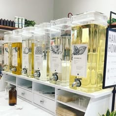 several bottles of different types of oils on display