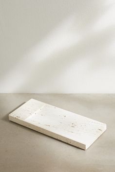 a white tray sitting on top of a table