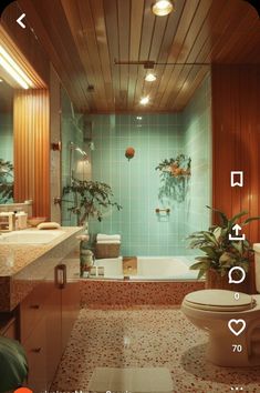 an image of a bathroom with plants in the bathtub and on the wall next to the toilet