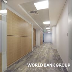 the world bank group is located in an empty office building with wood paneling and white walls