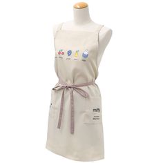 a white apron with cartoon characters on it