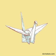 an origami bird is flying in the sky