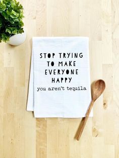 a tea towel that says stop trying to make everyone happy you aren't tequila