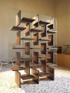 an artistic sculpture made out of bookshelves in a room with tile flooring