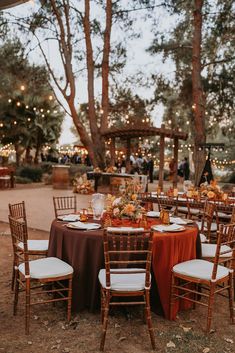 the tables are set up for an outdoor dinner