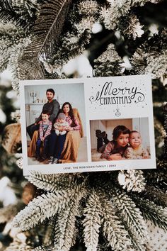 an ornament is hanging on a christmas tree with two pictures of people in it