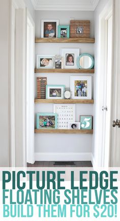 some shelves with pictures on them in a white walled room, and the bottom shelf is filled with photos