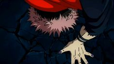 an anime character with red hair and black eyes holding his hand up to the ground