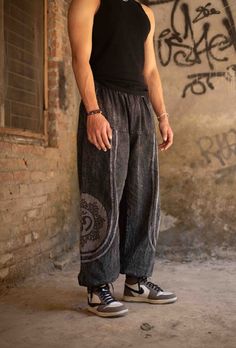 Elevate Your Festival Wardrobe with These Stunning Unisex Stonewashed Baggy Spiritual Pants! Designed for ultimate comfort and style, these unisex stonewashed baggy pants are the perfect addition to your festival wardrobe and everyday look. Crafted from sustainable, eco-friendly cotton, these trousers are ideal for those who value both fashion and the environment. Whether you're dancing at a festival, flowing through yoga, or simply embracing your free-spirited lifestyle, these pants will keep y Full-length Cotton Harem Pants For Streetwear, Full Length Cotton Harem Pants For Streetwear, Full-length Cotton Harem Pants With Pockets, Cotton Full Length Harem Pants For Streetwear, Gray Full-length Cotton Bottoms, Casual Black Cotton Harem Pants, Relaxed Fit Full Length Cotton Bottoms, Summer Cotton Relaxed Fit Harem Pants, Summer Relaxed Fit Cotton Harem Pants