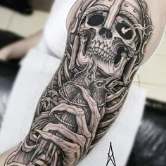 a man with a skeleton tattoo on his arm holding a knife and looking at the camera