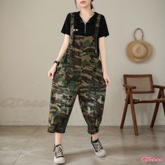 Comfortable Fashion-Forward Loose-Fitting Pants with Belt Detail Casual Baggy Overalls, Trendy Non-stretch Overalls, Casual Overall Pants For Fall, Trendy Overall Pants With Pockets, Fall Overalls With Pockets, Fall Season Overalls With Pockets, Baggy Overalls Pants For Spring, Casual Camouflage Jumpsuits And Rompers For Spring, Baggy Overalls For Spring