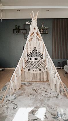 a large white hammock sitting on top of a rug