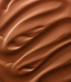 a close up view of chocolate swirls on the surface