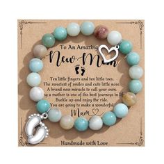 a bracelet with the message to an amazing mom on it, and a heart charm