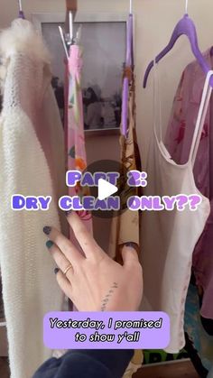 a person holding up an item in front of clothes on hangers with text that reads, part 8 dry clean only?