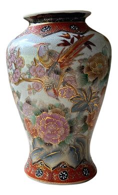 a large vase with flowers painted on it