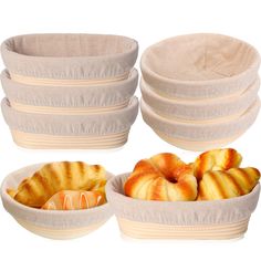 four bowls filled with croissants next to each other on a white background