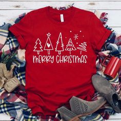 Christmas Cotton T-shirt, Red Short Sleeve Tops For Winter, Red Crew Neck Christmas Top, Red Crew Neck Top For Christmas, Red Graphic Print T-shirt For New Year, Red Crew Neck Top For Gift, Red Crew Neck Holiday Top, Red Crew Neck Top For Holiday, Red Holiday Crew Neck T-shirt