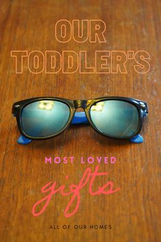 sunglasses with the words our toddlers most loved gifts all of our home's