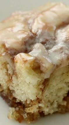 a close up of a piece of cake with icing on it's surface