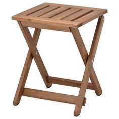 a small wooden stool with wheels on it