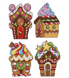 four different gingerbread houses with candy on them