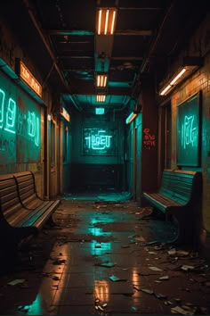 an empty subway station with benches and graffiti on the walls, in the dark at night