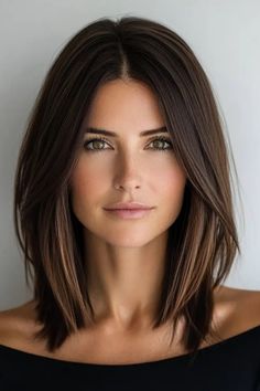 Woman with shoulder-length brown hair and a serious expression in a black off-shoulder top, against a plain background. Hairstyle Frame Face, Short Or Medium Haircuts, Short Hair With Straight Hair, At Shoulder Haircut, Trendy Haircuts For Shoulder Length Hair, Wedding Guest Hairstyles Medium Straight, How To Style Collarbone Length Hair, Collarbone Length Bob Haircut, Square One Length Below The Shoulder