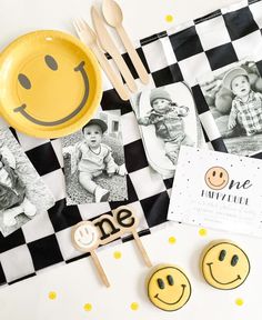 a table topped with pictures and wooden utensils on top of a checkered table cloth