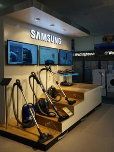 the samsung store is clean and ready for customers to use their machines or vacuums