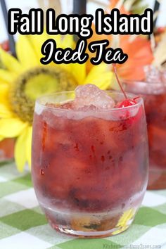 two glasses filled with iced tea sitting on top of a table